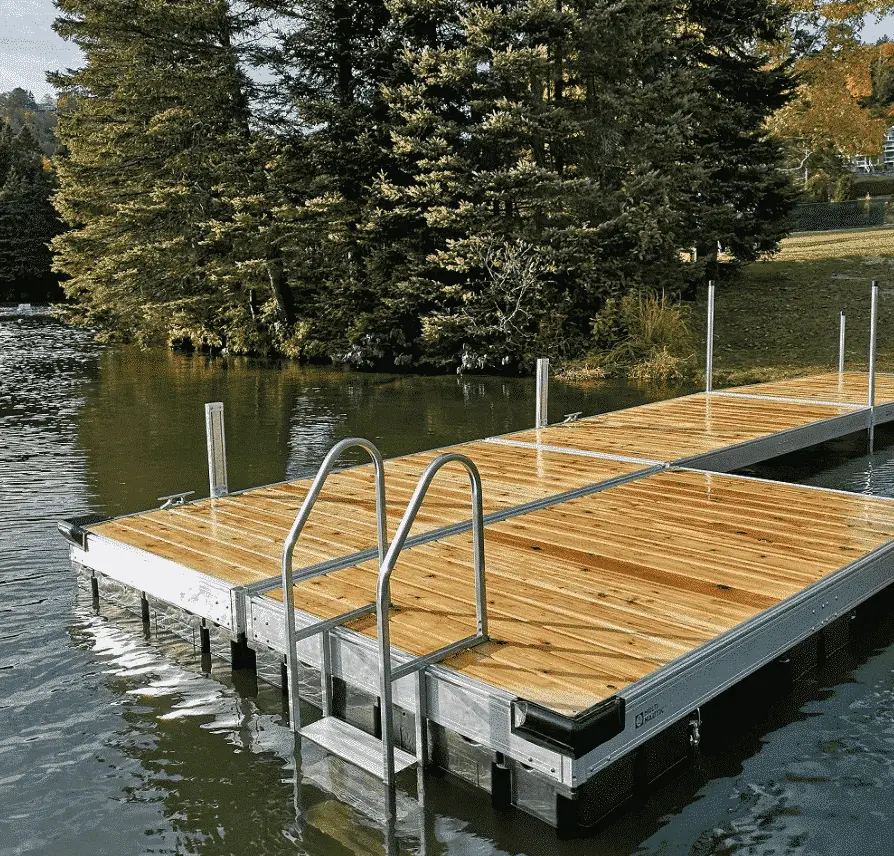 Aluminum floating dock with ladder into the water.